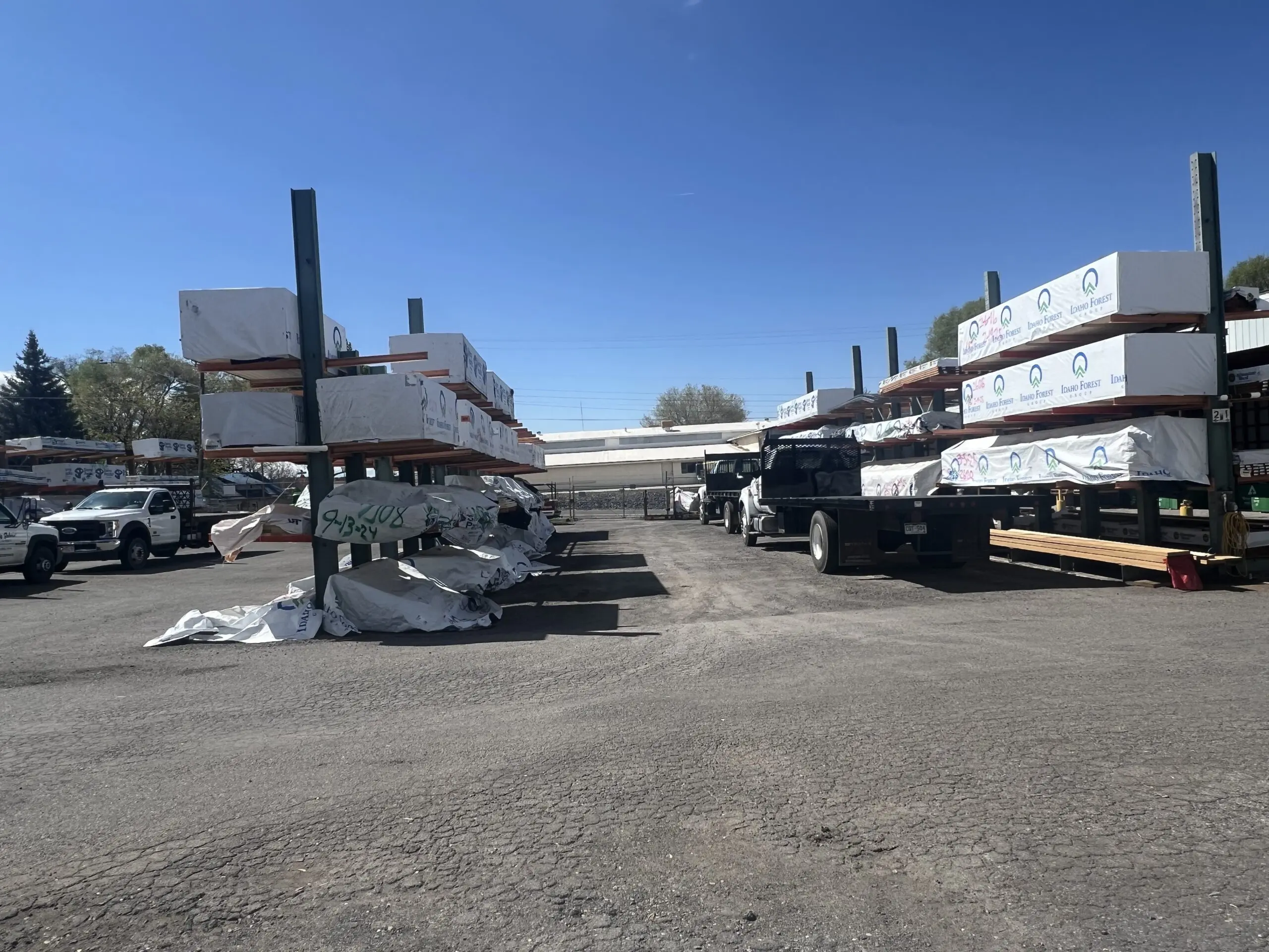 A lot of metal structures in the middle of a parking lot.