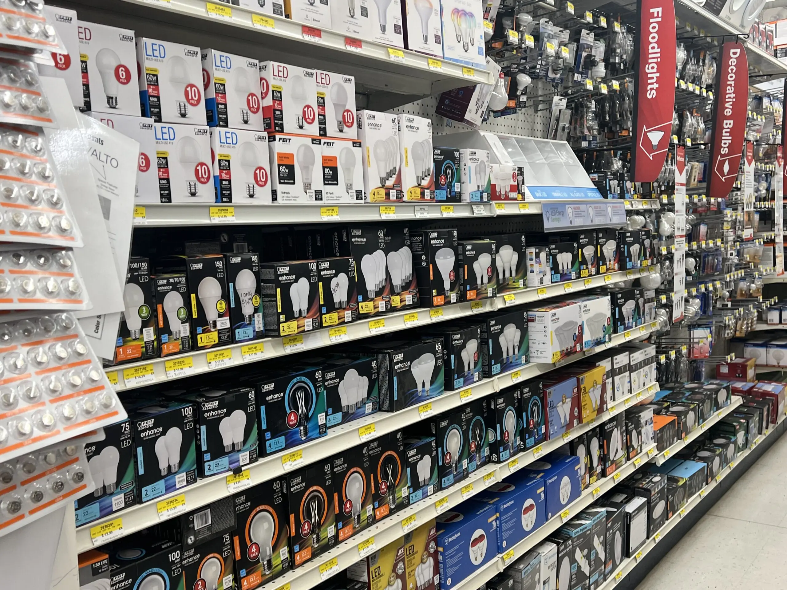A store shelf filled with lots of different items.