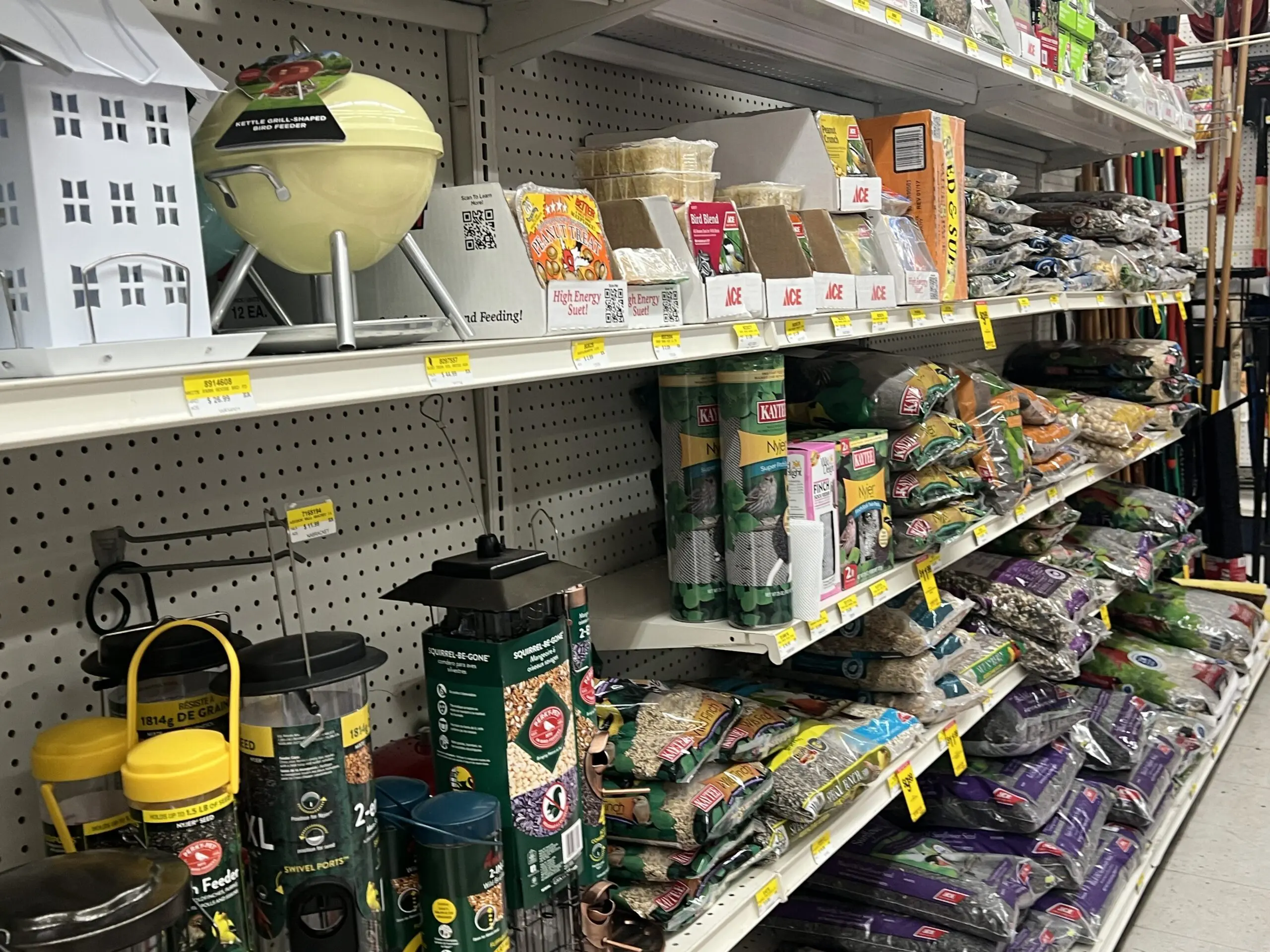 A store shelf filled with lots of food.